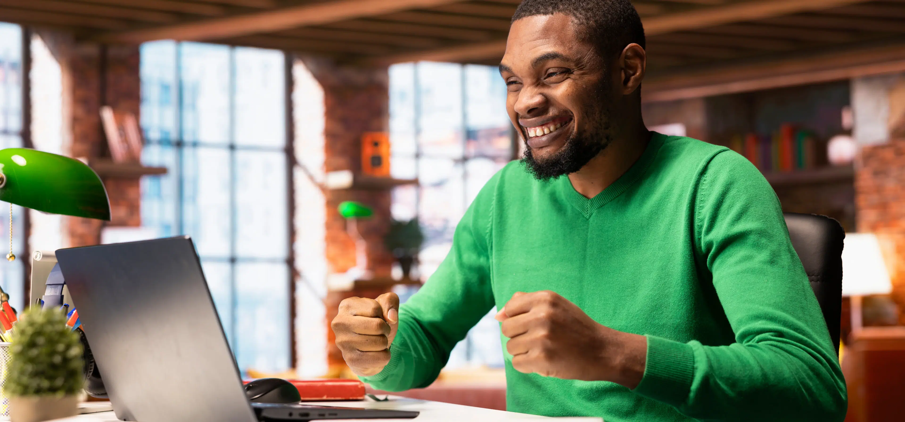 Business owner at laptop